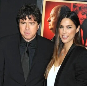 Sacha Gervasi with his wife.